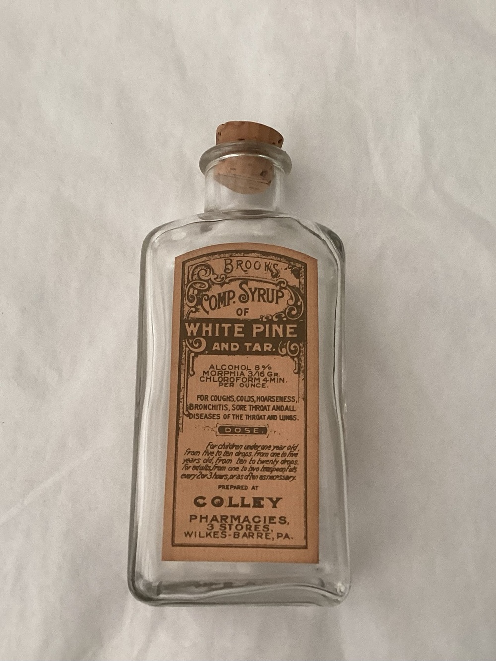 Antique Original antique clear glass medicine bottle with original label. Mint!
